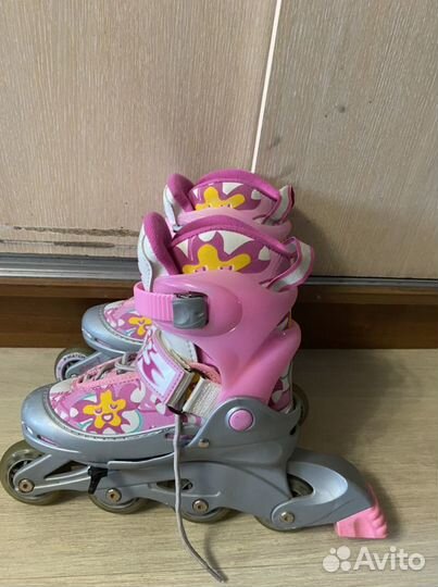 Роликовые коньки