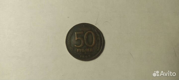 Монета
