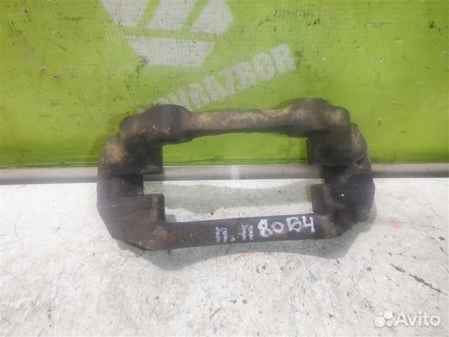 Скоба суппорта переднего Ауди 80 90 Б4