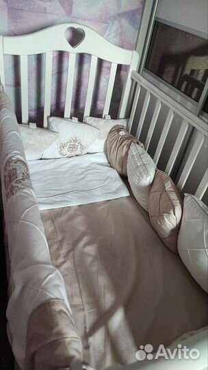 Детская кроватка с поперечным маятником