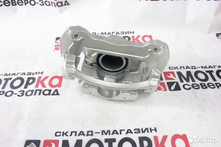 Суппорт тормозной передний правый Mitsubishi L200