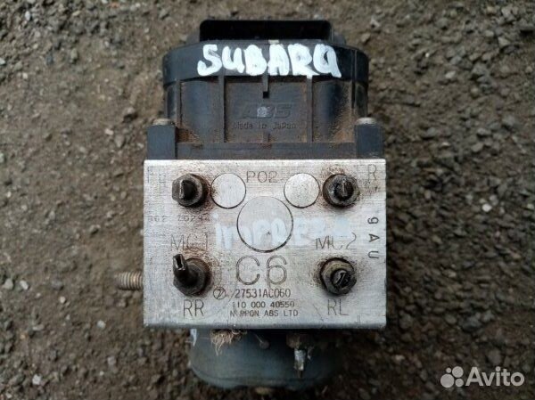 Блок (насос ) ABS Subaru Legacy Outback B12
