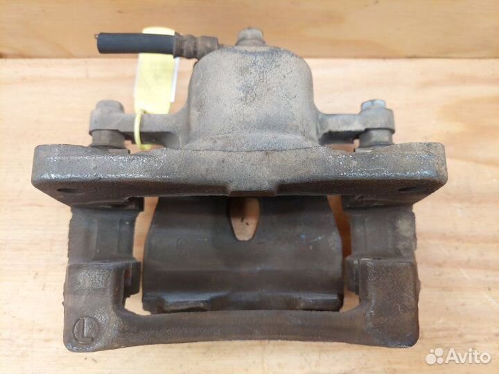 Суппорт передний левый Toyota Vitz KSP90 1krfe