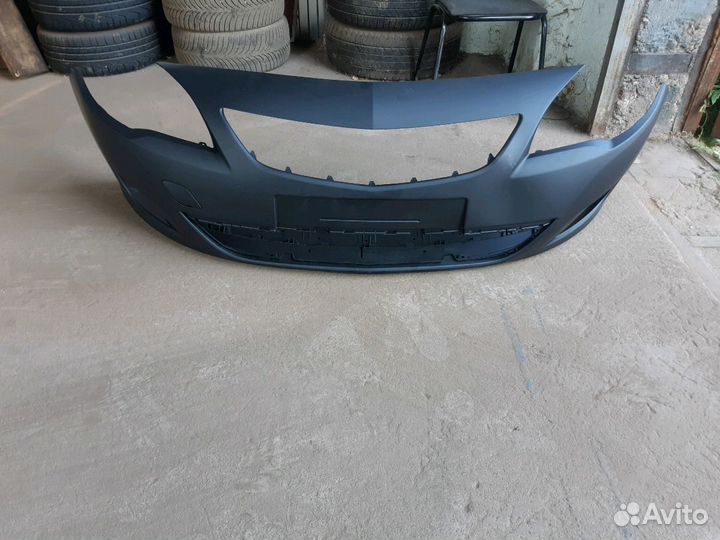 Бампер передний Opel Astra J дорестайлинг