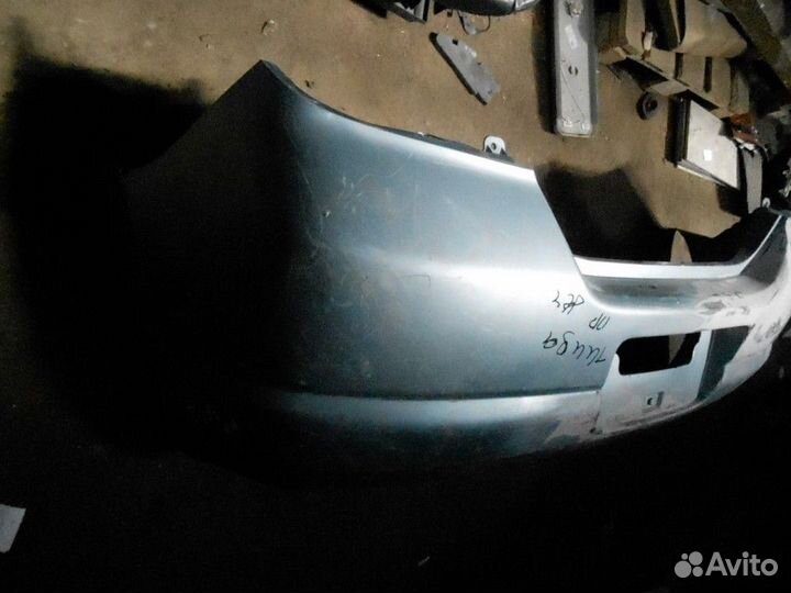 Бампер задний Nissan Tiida 2007-2015