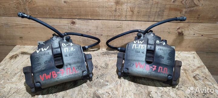 Суппорт передний Volkswagen Passat B7