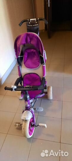 Трехколесный велосипед с ручкой