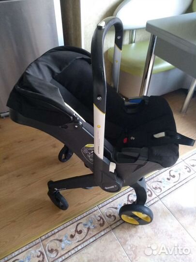 Коляска - автокресло Doona