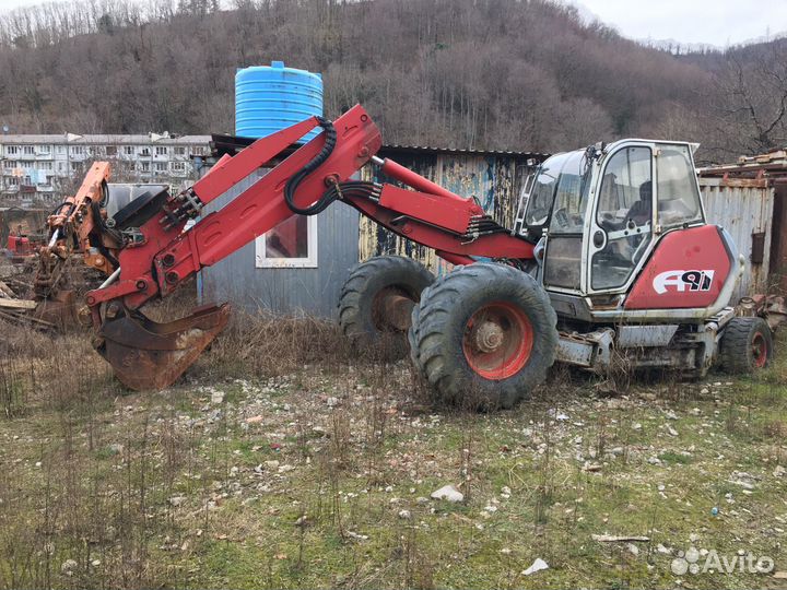 Колёсный экскаватор MENZI Muck A91 Mobil, 2003