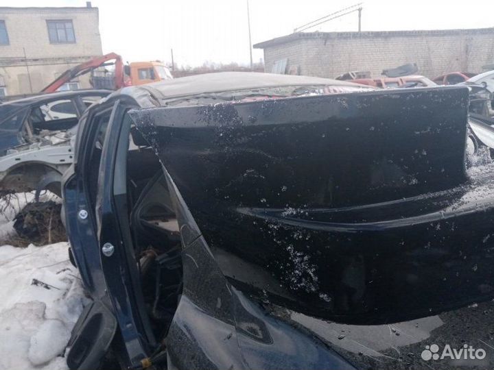 Бампер задний Mazda Demio 1998