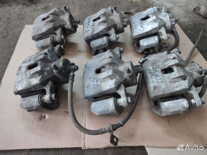 Суппорт тормоза передний Kia Cerato 3 YD 2012-20