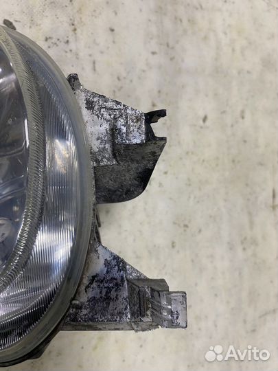 Фара противотуманная левая Peugeot 206