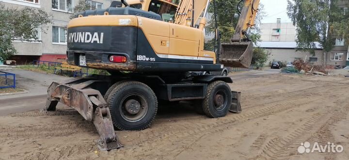 Колёсный экскаватор Hyundai R180W-9S, 2013