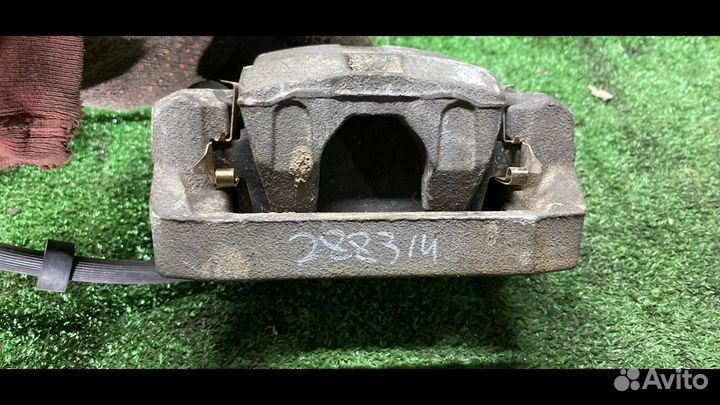 Суппорт тормозной задний левый Mazda CX-9 1