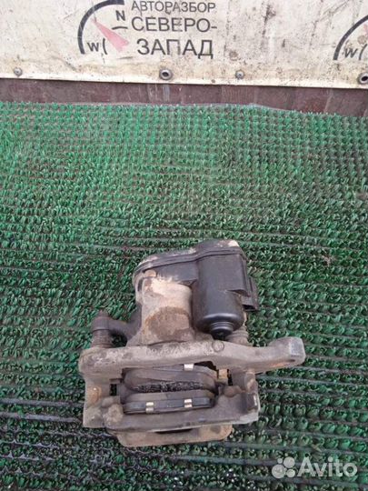 Суппорт задний левый Nissan Qashqai J11 MR20DD 2.0