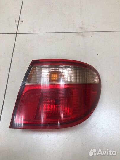 Фонарь наружный правый Nissan Almera