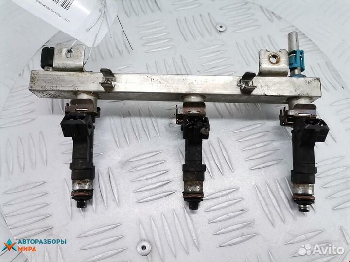 Форсунка Opel Corsa D 2007 55562250