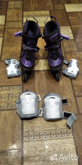 Роликовые коньки