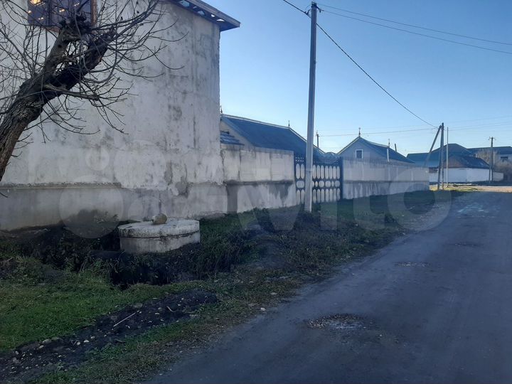 Дом 405,8 м² на участке 17,6 сот.