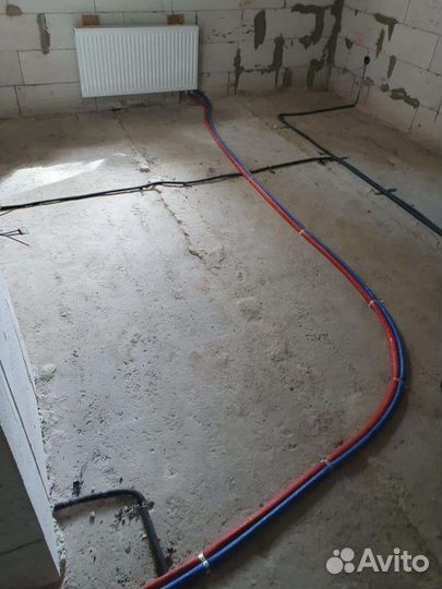 Монтаж системы отопления с тёплым полом в коттедже