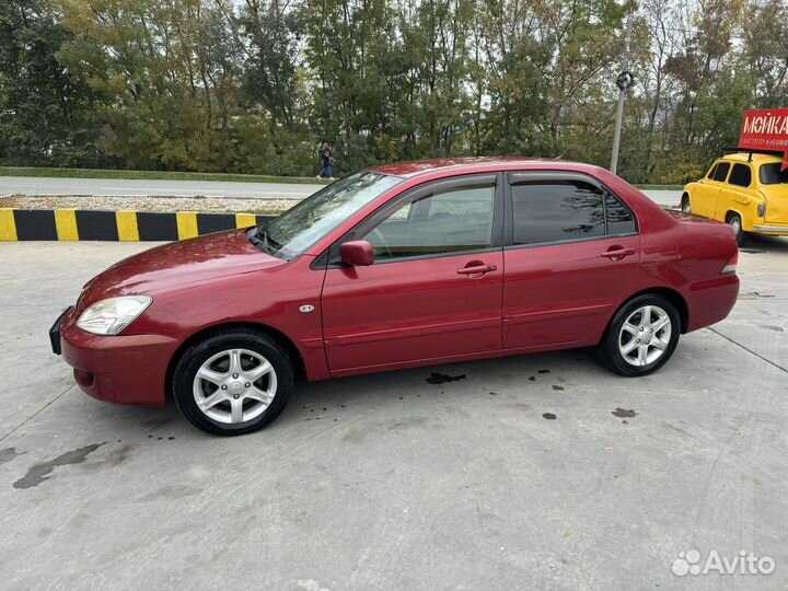 Mitsubishi Lancer 1.6 МТ, 2006, 238 500 км