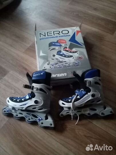 Роликовые коньки