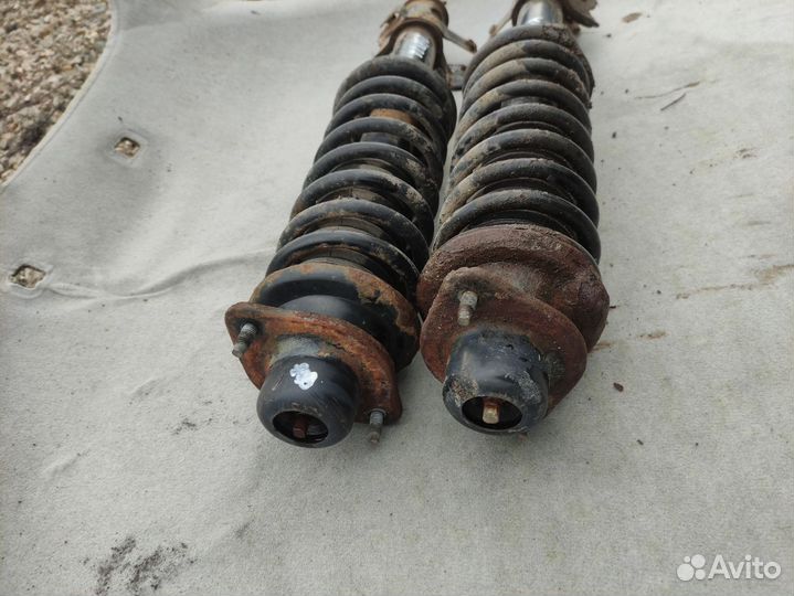 Стойка подвески передняя Nissan March/Micra K11