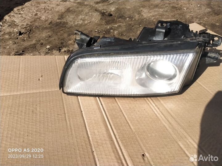 Фара передняя левая Mazda Xedos 9