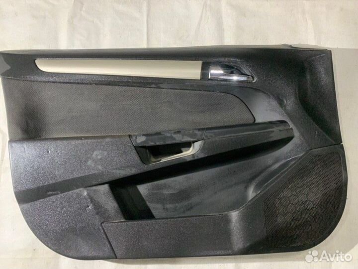 Обшивка двери передняя левая Opel Astra H