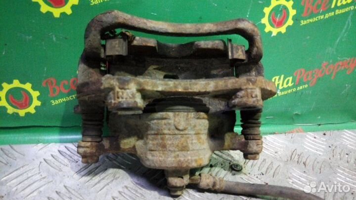 Суппорт передний правый Nissan Sunny седан 1.5