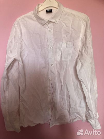 Продам белую рубашку на мальчика 152 см