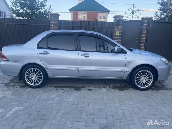Mitsubishi Lancer 1.6 МТ, 2005, 300 000 км