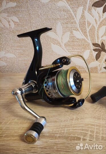 Спиннинг.Катушка.Подсачек.Налобный фонарь.Воблеры