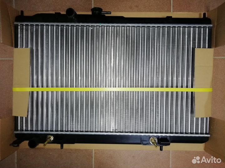 Радиатор двигателя Almera Classic