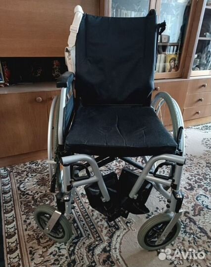 Инвалидная коляска
