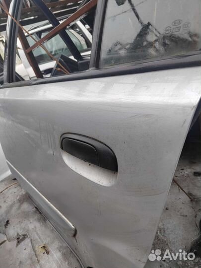 Задняя левая дверь Kia Rio 2 хетчбек