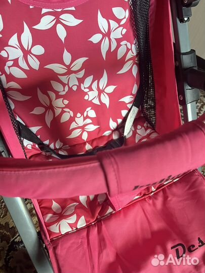 Прогулочная коляска розовая