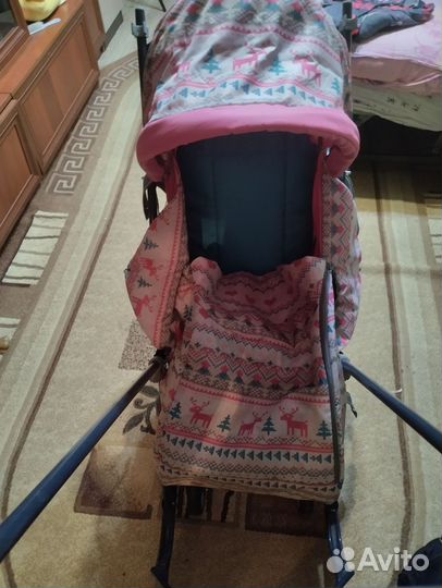 Детские санки с выдвижными колесами