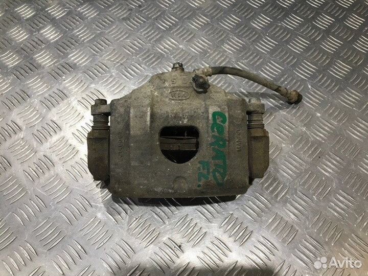 Суппорт передний левый Kia Cerato 2008