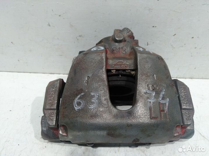 Суппорт тормозной передний левый Focus III 2011