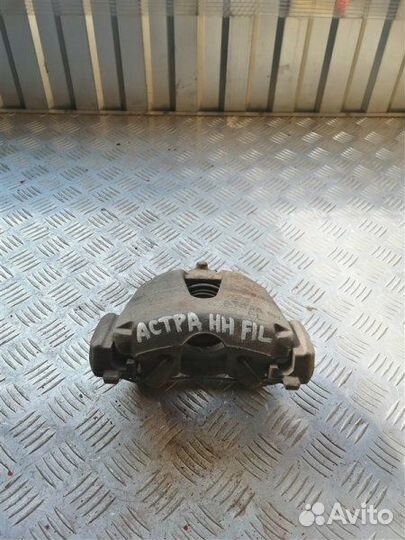 Суппорт тормозной передний левый Opel Astra H L48