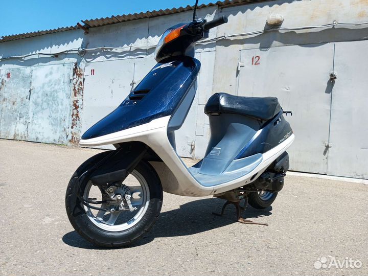 Скутер honda tact