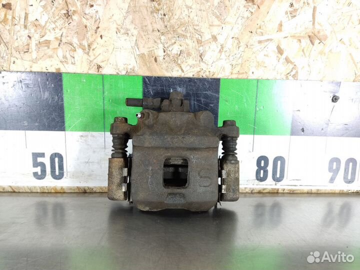 Суппорт передний правый Mazda Carol 2004-2009