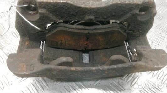 Суппорт тормозной передний левый nissan qashqai J1