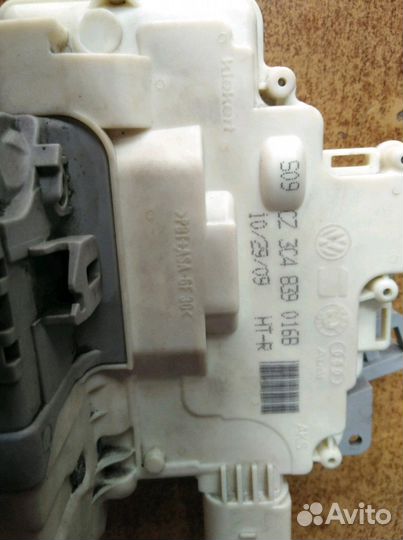 Замок двери на пассат б6