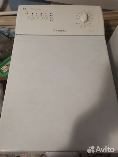 Вертикальная стиральная машинка электролюкс 825