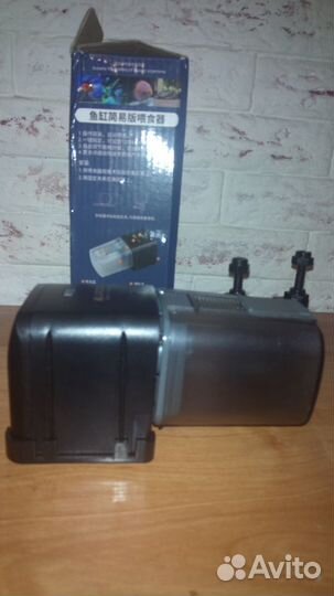 Аквариумная автоматическа кормушка