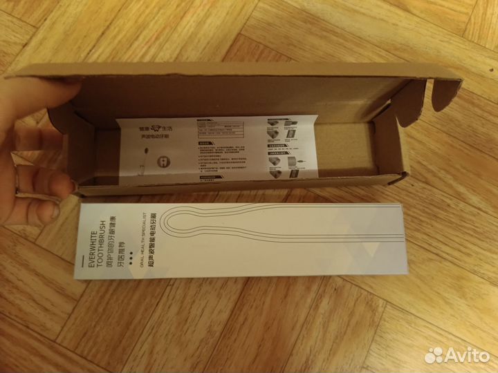 Электрическая зубная щетка