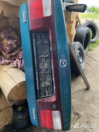 Крышка багажника mazda 323