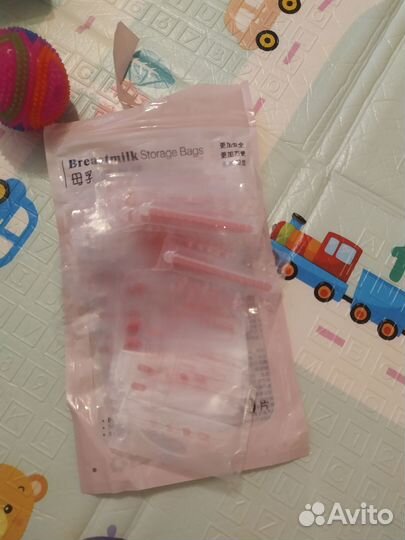 Молокоотсос ручной babygo + пакеты для молока